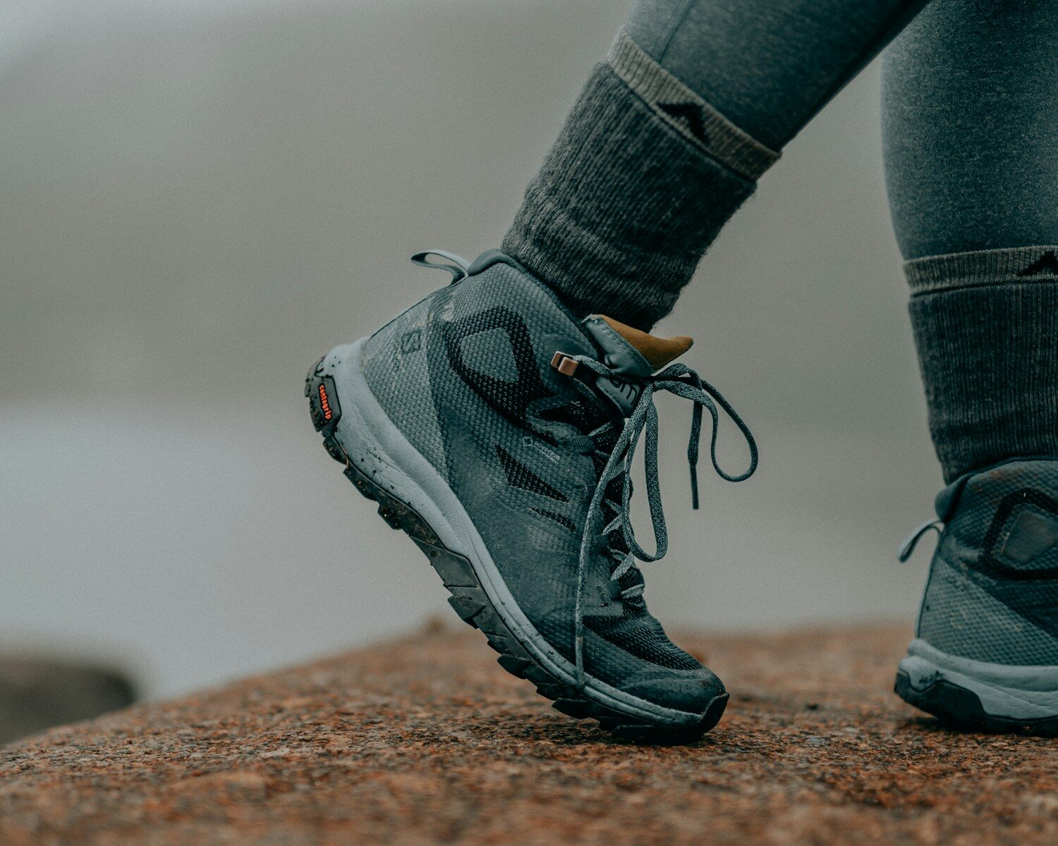 Photo by Clay Banks person in gray nike running shoes